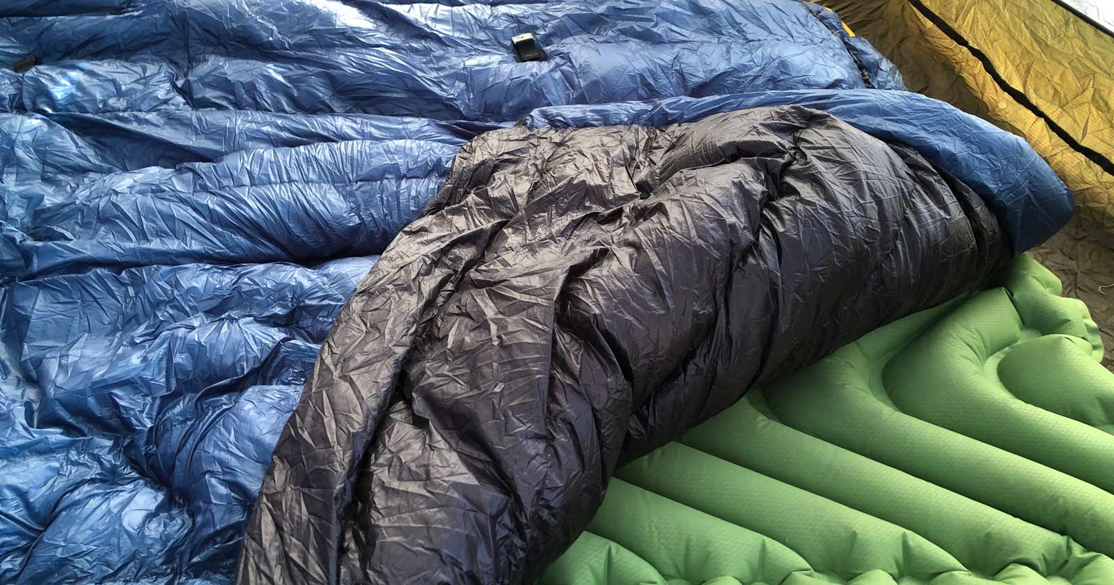 A quilt serves as an insulated blanket