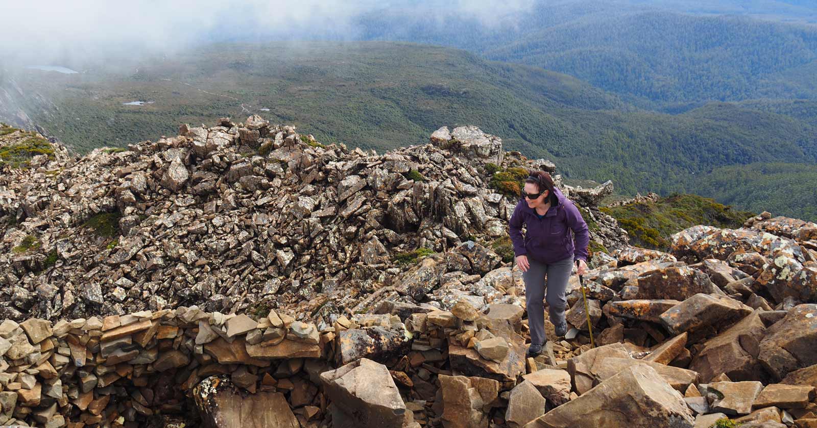 Walking over boulders requires balance